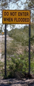 7 Do not enter when flooded sign in Tucson near Desert Wash